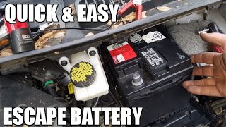 How to Replace Battery in a 1319 Ford Escape [upl. by Anaylil302]