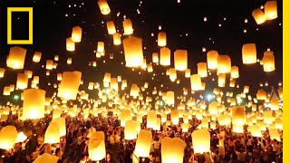 Watch as Lanterns Fill the Sky in Thailand  National Geographic [upl. by Cogan946]