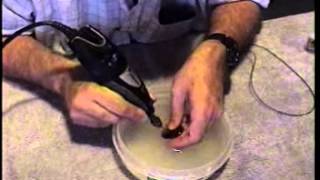 How to Drill a Hole In a Tiger Eye Stone Cabochon for a Pendantmp4 [upl. by Tati]