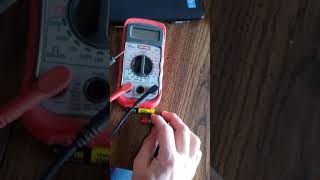 How to test AAA battery with voltmeter [upl. by Htenywg740]