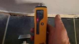 A damp meter used to falsely diagnose rising damp [upl. by Dilan]