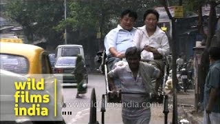 Handpulled rickshaws in City of Joy  Kolkata [upl. by Agemo176]